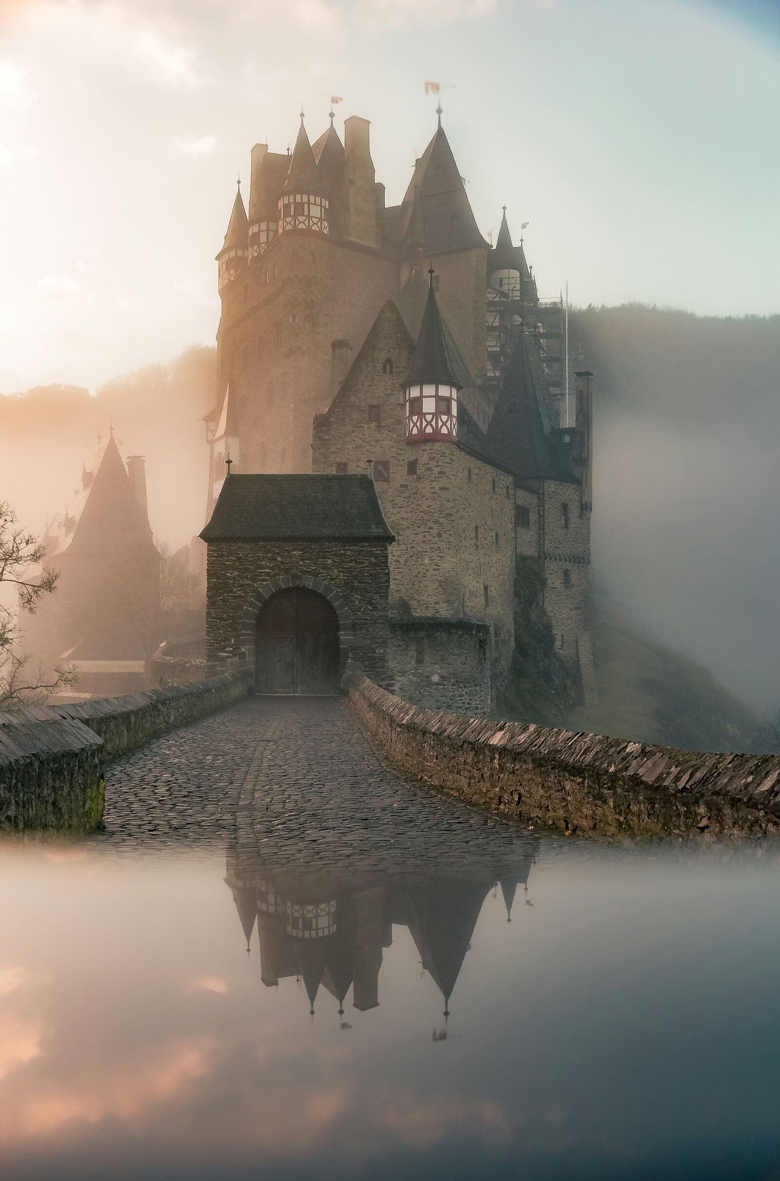 A fog-veiled castle, ancestral seat of House Zartavius